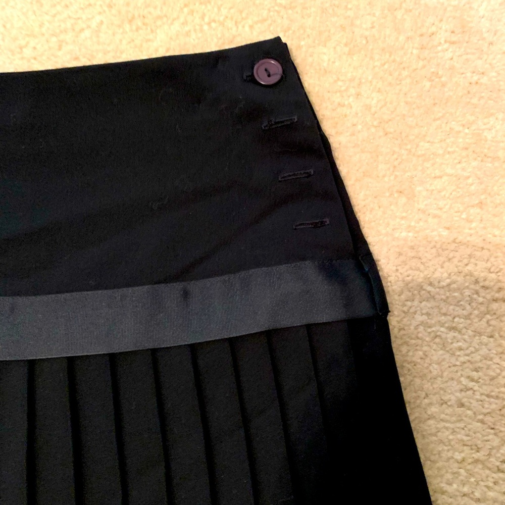 Heart Moon Star mini skirt with accent button. Adorable with or without tights!